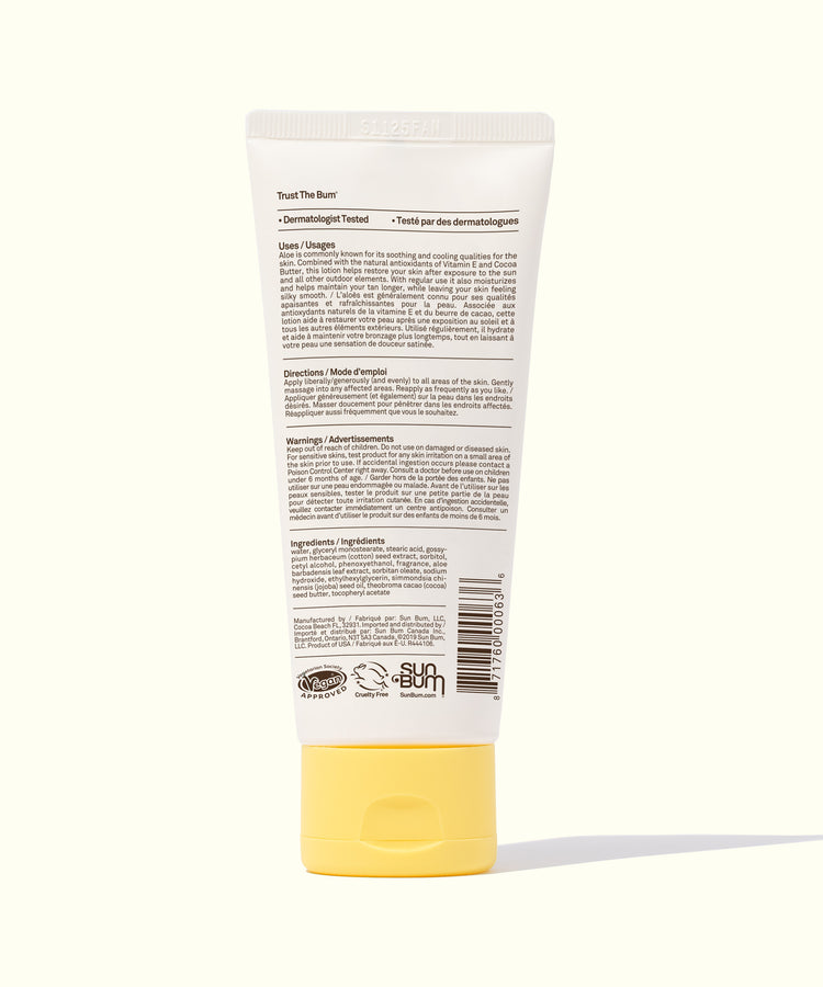 Tube of sunscreen with a white label and yellow cap on a white background