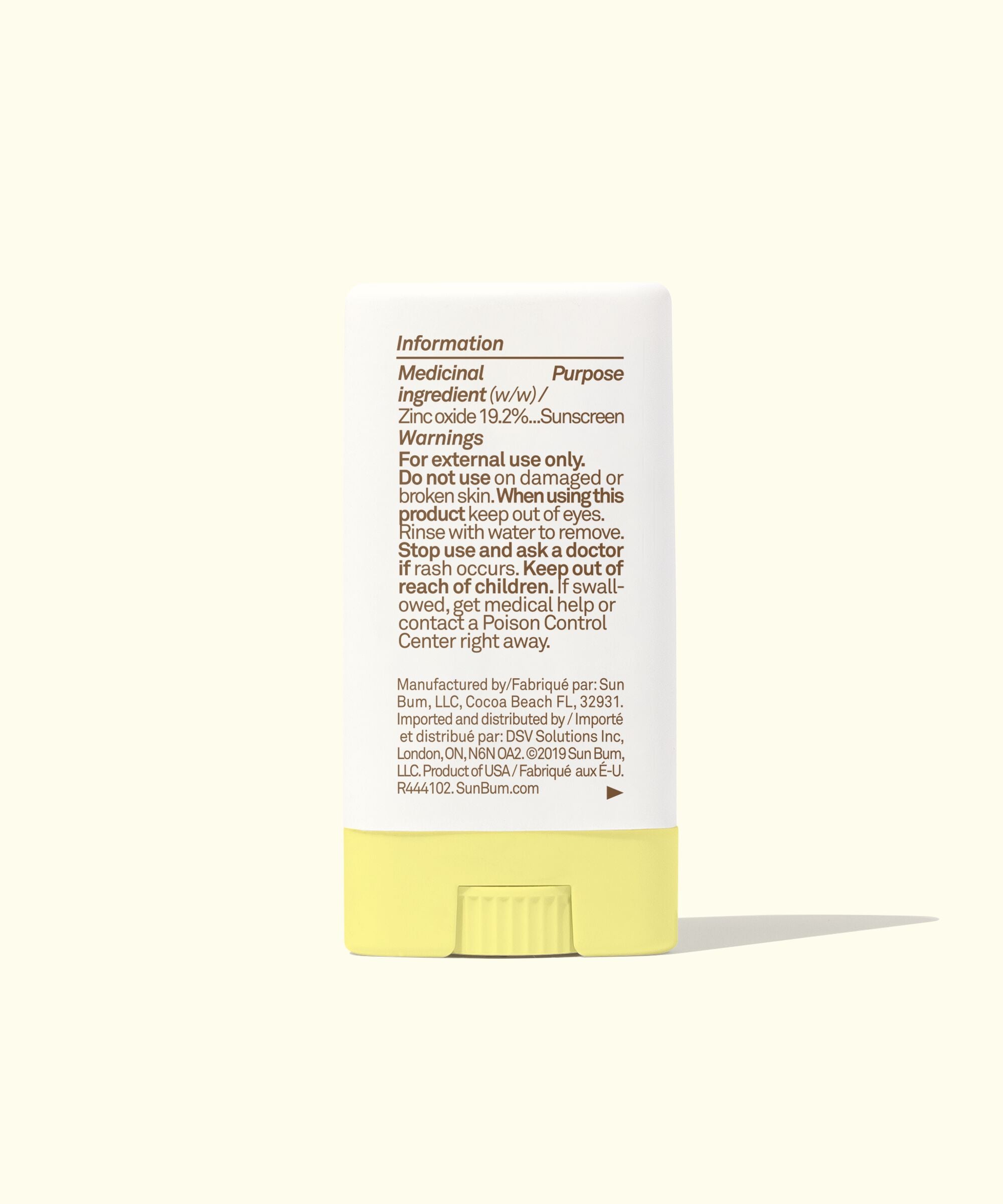 Yellow and white container with label on a white background