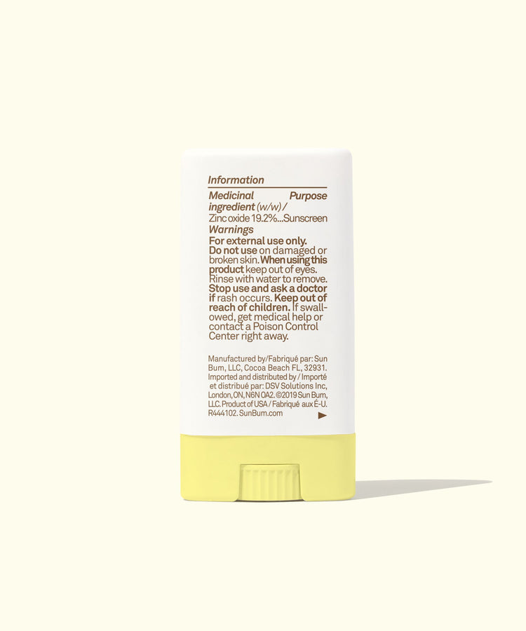 Yellow and white container with label on a white background