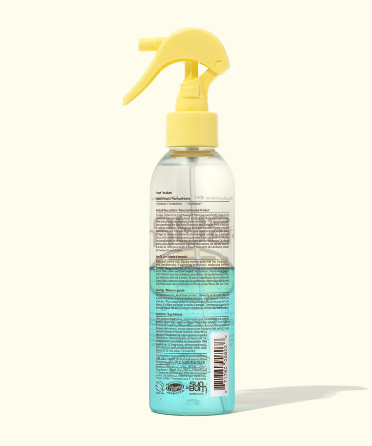 Clear spray bottle with yellow nozzle on a white background