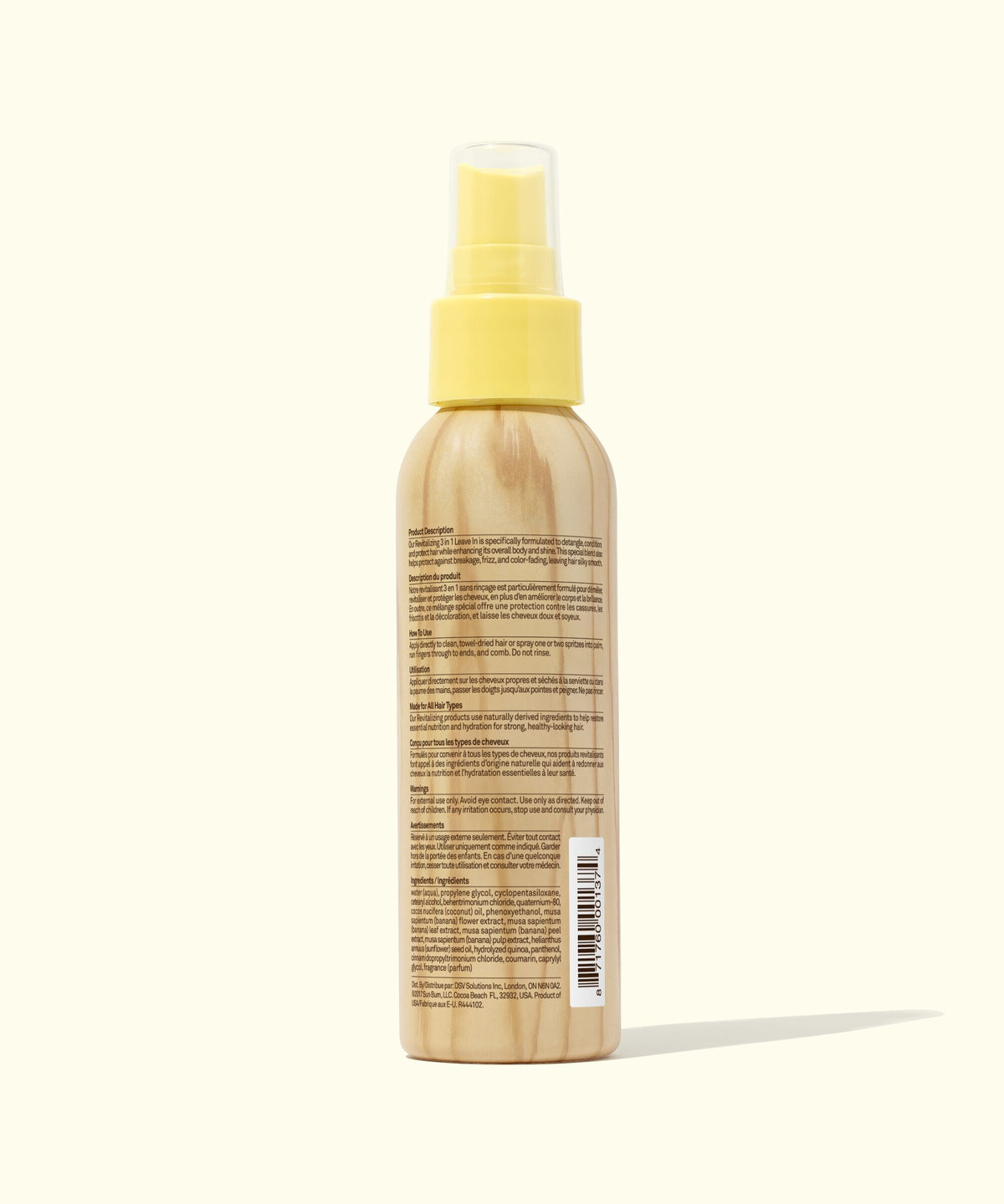 Bottle with yellow cap on a white background