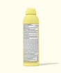 Yellow spray bottle with a label on a white background