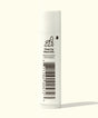 White tube with barcode and text on a white background
