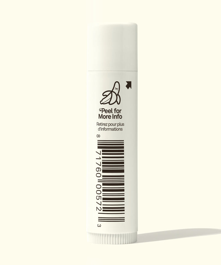 White tube with barcode and text on a white background