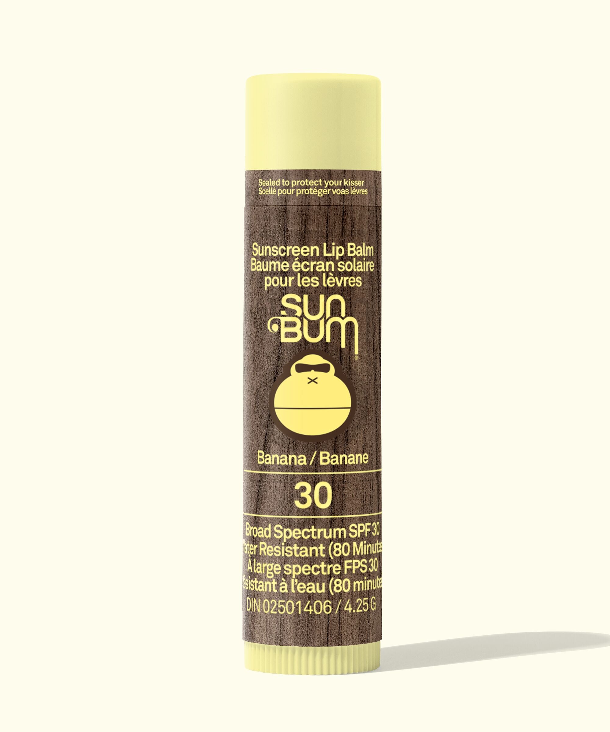 Sun Bum sunscreen lip balm tube with banana flavor on a white background