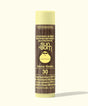 Sun Bum sunscreen lip balm tube with banana flavor on a white background
