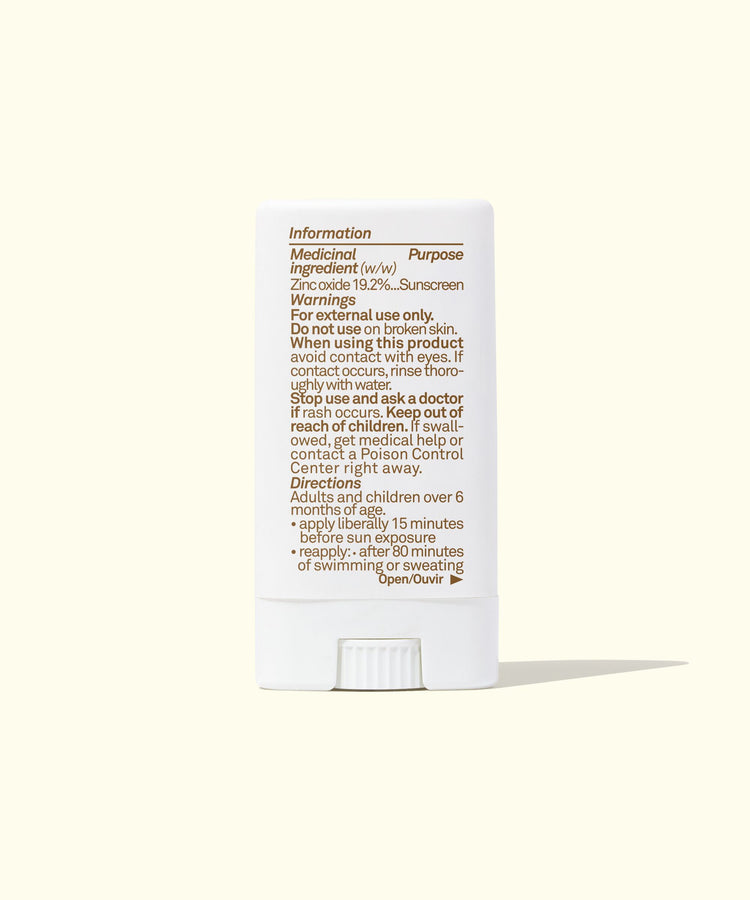 Sunscreen stick with label on a white background