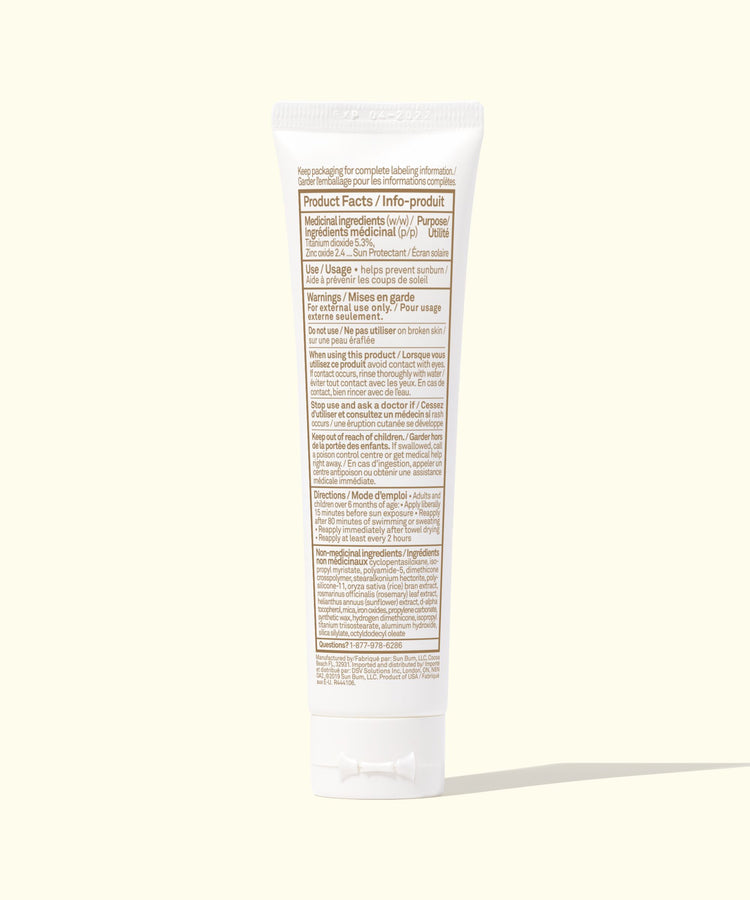 Tube of cream with label on a white background