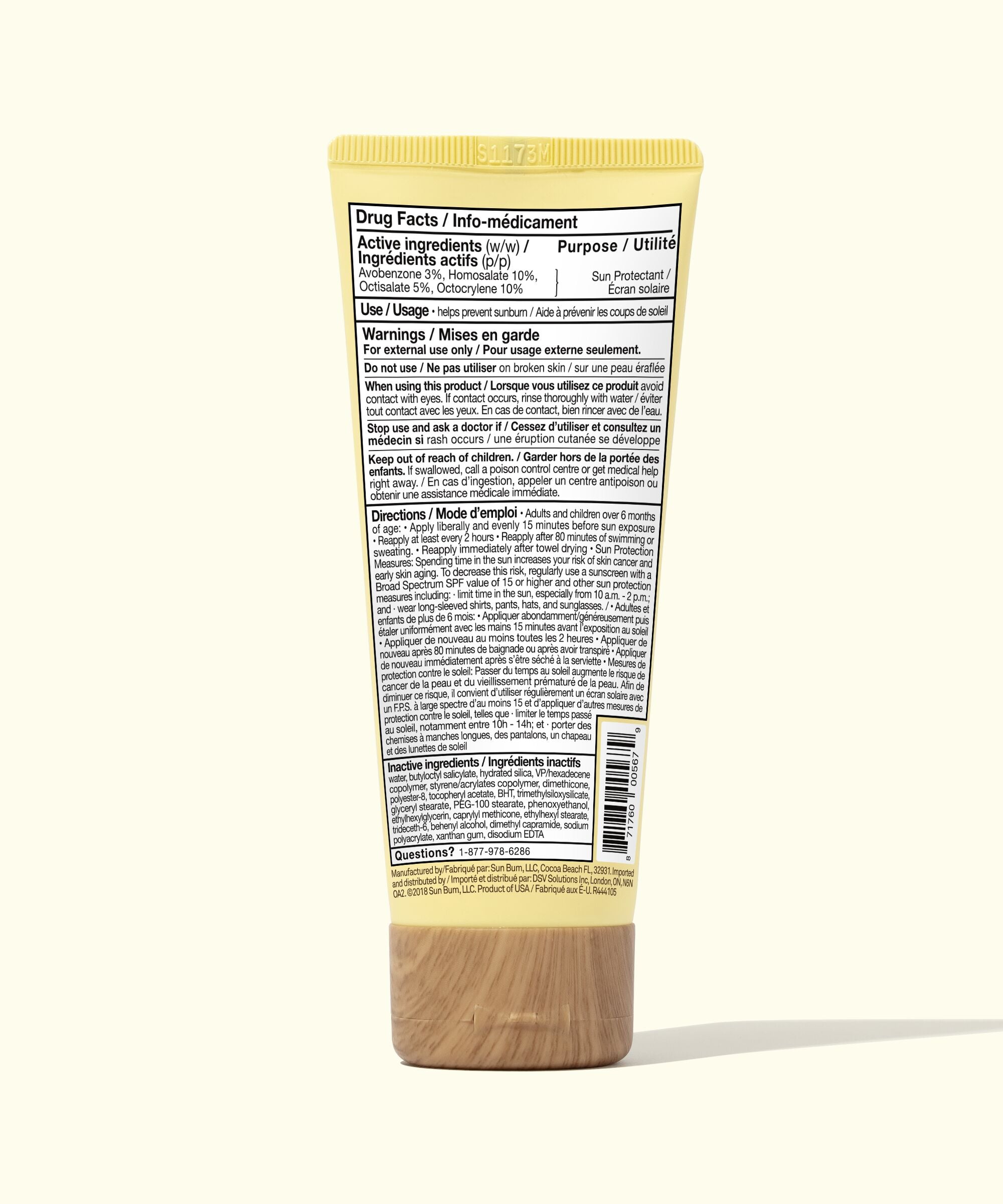 Back view of a tube with text and a label on a white background