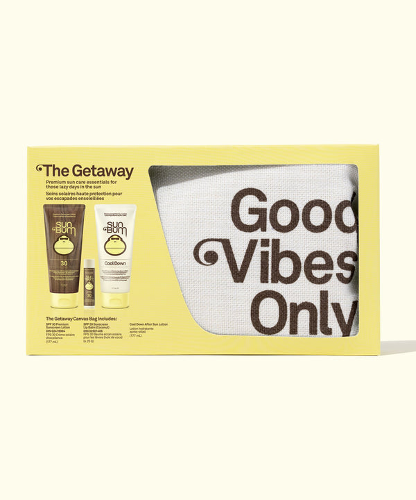 Product set with 'Good Vibes Only' mug and two bottles on a yellow background
