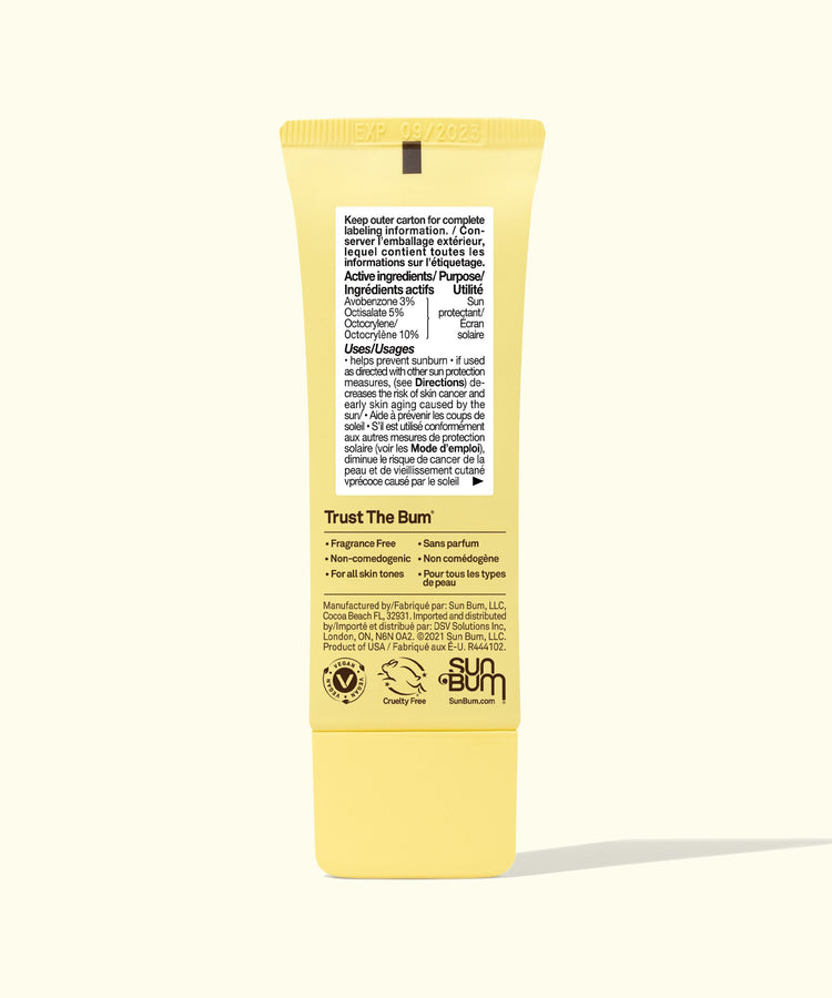 Yellow tube of 'Trust The Bum' body lotion with text on a white background