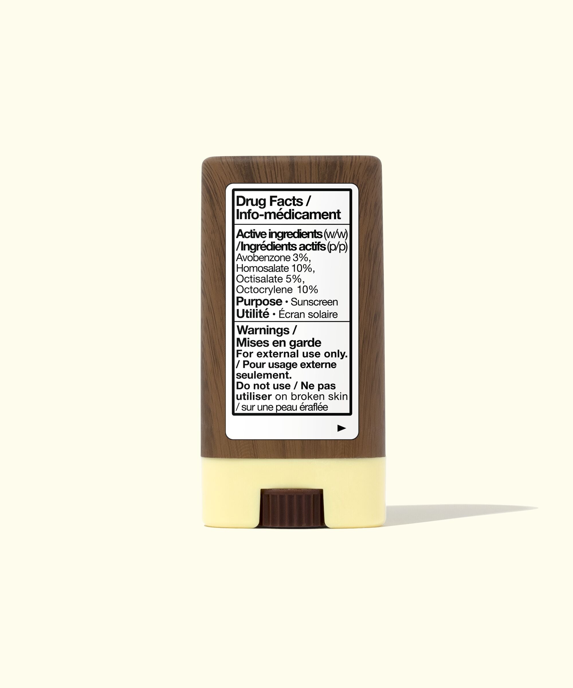 Sunscreen stick with label on a white background