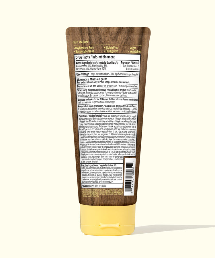 Back view of a tube with text and a label on a white background