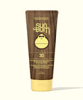 Sun Bum sunscreen lotion tube with brown and yellow design on a white background