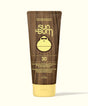Sun Bum sunscreen lotion tube with brown and yellow design on a white background
