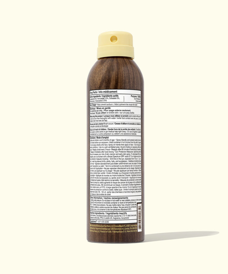 Wooden bottle with a beige cap on a white background