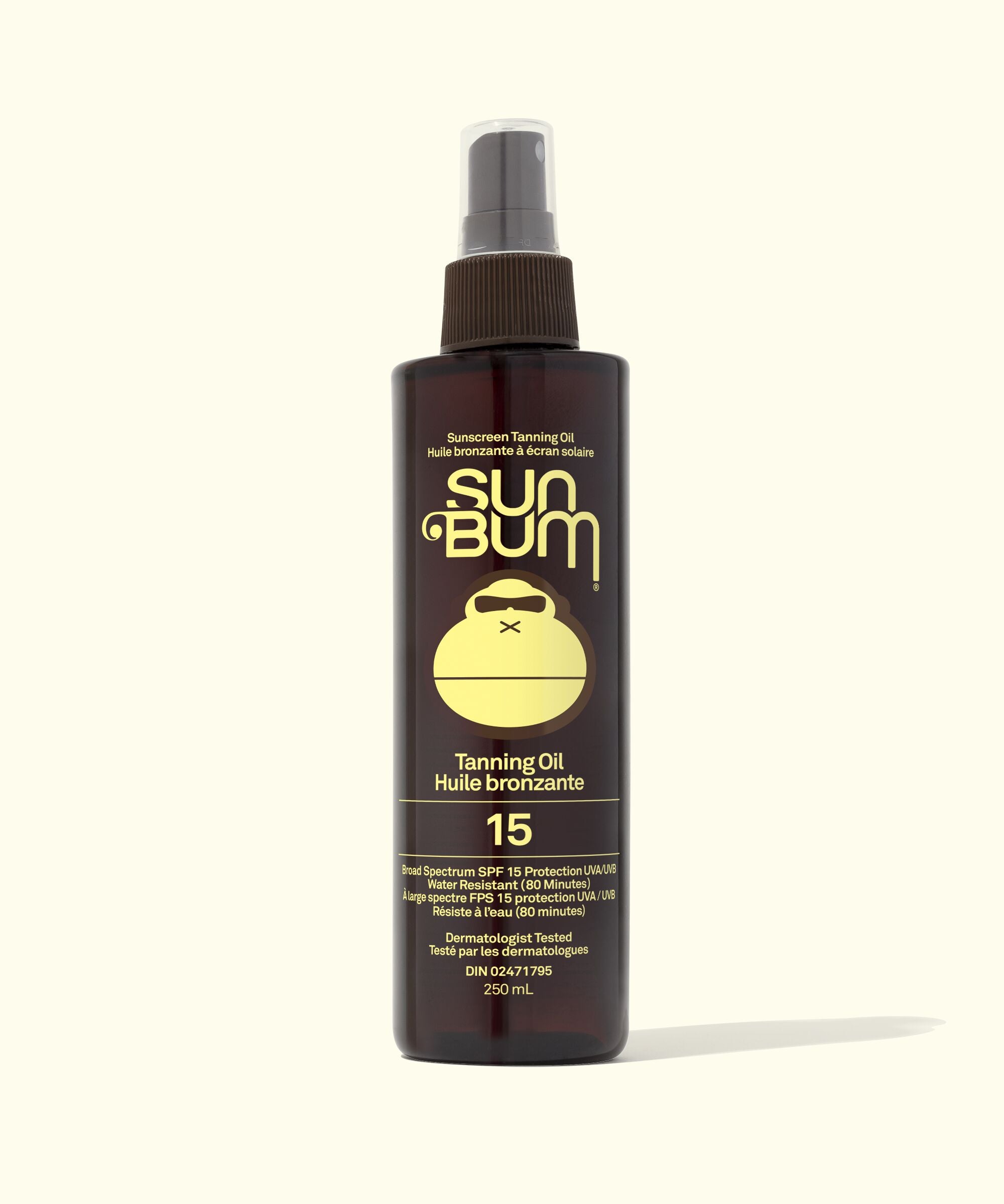 Sun Bum tanning oil spray bottle on a white background