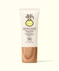 Sun Bum Daily Face Lotion 50 with wooden applicator on white background