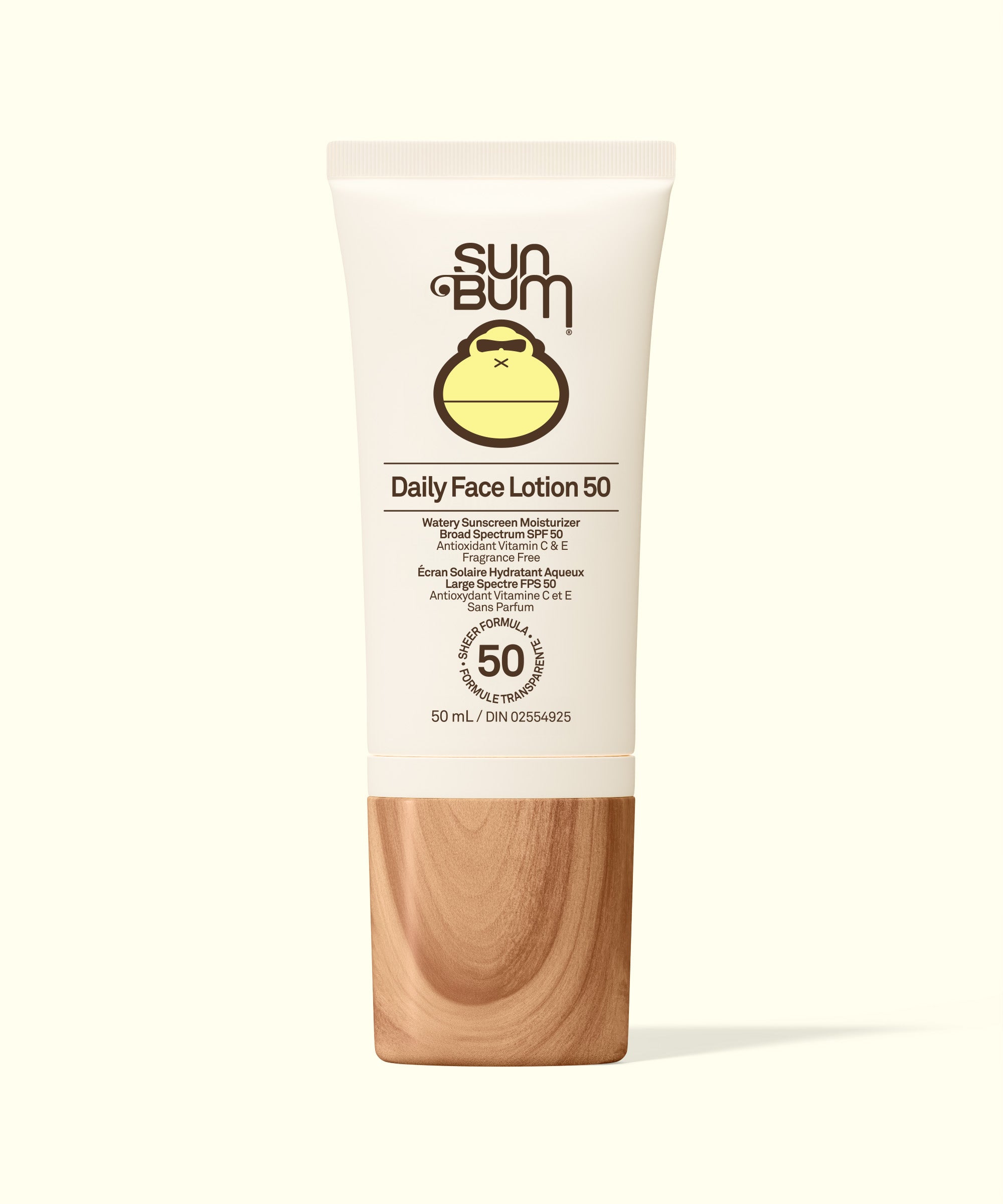 Sun Bum Daily Face Lotion 50 with wooden applicator on white background